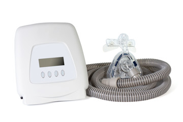 Cpap  components..A continuous positive airway pressure with premium quality of mask and hose used for obstructive sleep apnea patient ,isolated on white background .