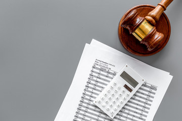 Declare bankruptcy concept. Judge gavel, financial documents, calculator on grey background top view