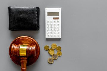 Financial failure, bankruptcy concept. Judge gavel, wallet, coins, calculator on grey background...