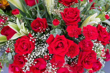 Red Artificial Bouquet Flower decor in ceremony.