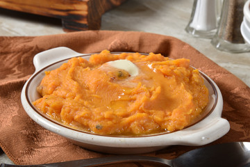 Butter melting on mashed sweet potatoes