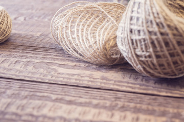 Supplies for decorating a glass bottle. Ecological twine, grue gun and other. Rustic style. Handmade gift for celebrations such as Christmas.