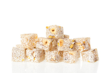 Turkish delight lokum with pistachio nuts isolated on a white background