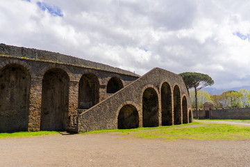 Pompeii, Naples/Italy - April 9, 2018: Pompeii Theater Entrance with cloudy sky