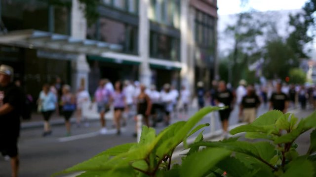 Defocused Protestors in downtown city area ALT