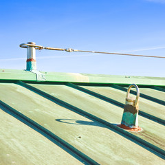 Fall protection steel cable on copper roof called life lines