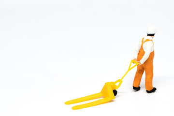 Miniature people delivery worker on white background with a space for text