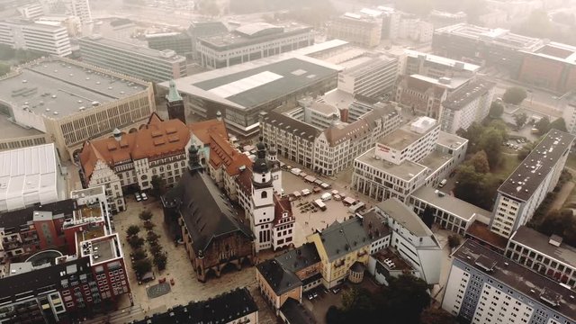 Fog over Karl-Marx-Stadt, Chemnitz in Germany. The camera sinks into the city at daylight..