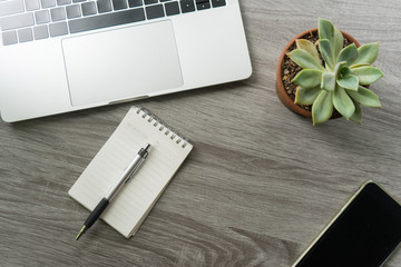 Flat lay laptop grey background