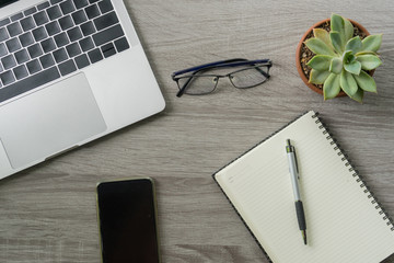 Flat lay laptop grey background