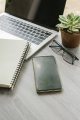 Flat lay laptop grey background