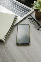 Flat lay laptop grey background