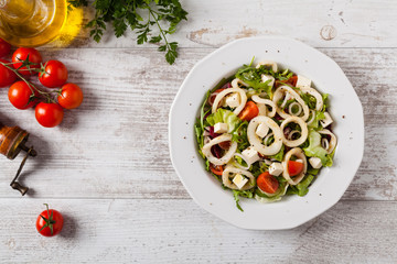 Fototapeta na wymiar Salad with squid rings.