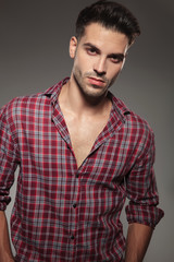 Fototapeta premium portrait of a young casual man in plaid shirt
