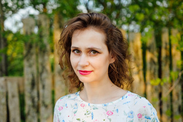 Fototapeta premium Beautiful young woman portrait, close up outdoor