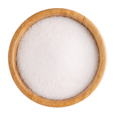 White refined sugar in wooden bowl isolated on white. Top view.