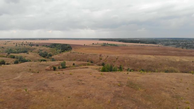 Panorama of countryside. Aerial drone view of autumn rural fields and farmland