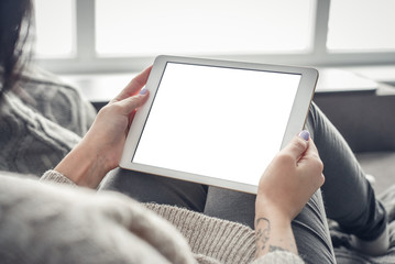 Mockup image of woman's hand holding white tablet pc