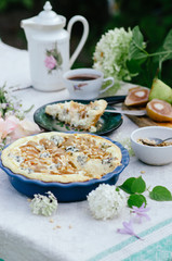 Pie whith pears, pine nuts and blue cheese in ceramic form, very delicious and tasty cake.