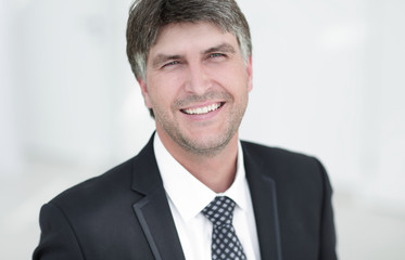 Portrait of a smiling successful businessman.