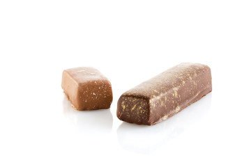 Handmade chocolate candy sticks isolated on white background