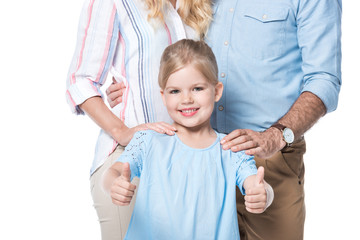 parents with child showing thumbs up isolated on white