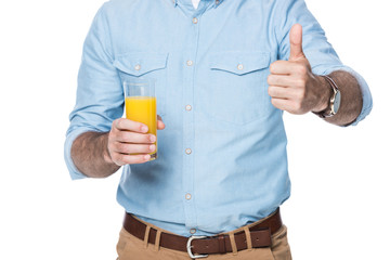 man with orange juice showing thumb up isolated on white