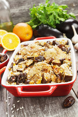 Chicken thigh baked with rice, eggplant and figs