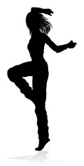 Fototapeta na wymiar A woman street dance hip hop dancer in silhouette