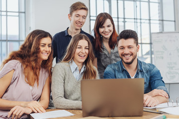 Happy motivated young business team