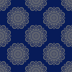 Seamless color decorative ornament in ethnic oriental style. Circular pattern in form of mandala for Henna, Mehndi, tattoo, decoration.