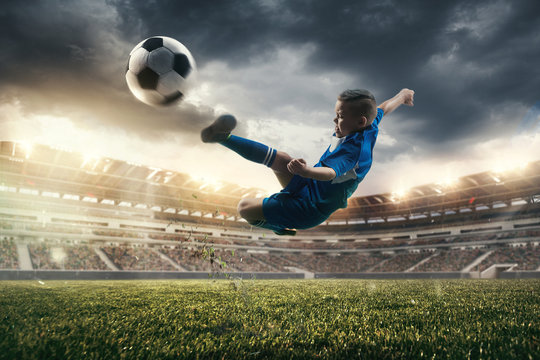 Young boy with soccer ball doing flying kick at stadium. football soccer players in motion on green grass background. Fit jumping boy in action, jump, movement at game. Collage