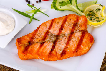 Grilled salmon with sauce