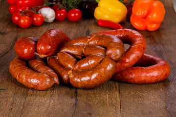 Pork sausages over wooden