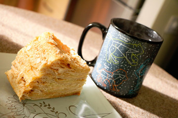 Сup of tea and cake on the table