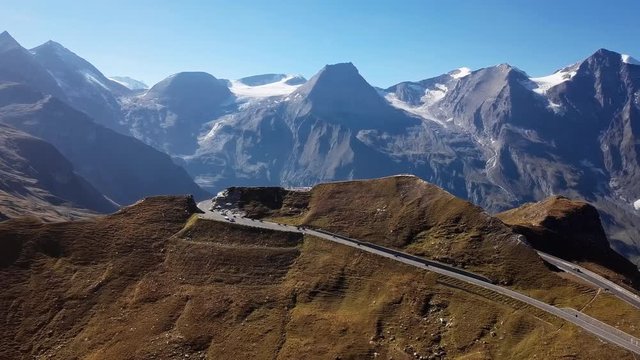 Flight around of Fuscher Torl pass on Grossglockner scenic High Alpine Road, Austria
