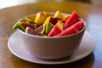Trendy pink buddha bowl of fruit salad