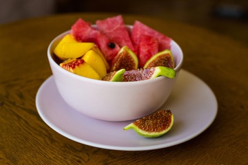 Trendy pink buddha bowl of fruit salad