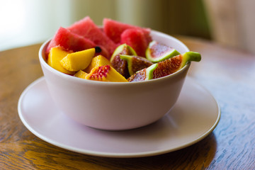 Trendy pink buddha bowl of fruit salad