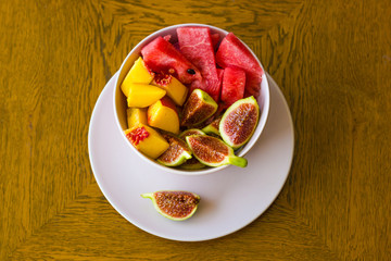 Trendy pink buddha bowl of fruit salad
