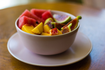 Trendy pink buddha bowl of fruit salad