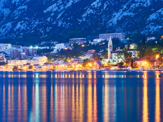 Fototapeta na wymiar Kotor bay in Montenegro at night. Water reflections 
