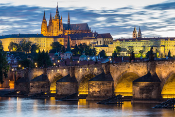 Obraz premium Famous iconic image of Prague castle and Charles Bridge, Prague, Czech Republic. Concept of world travel, sightseeing and tourism.