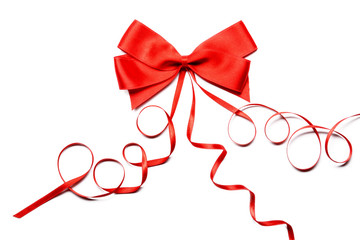 Beautiful bow made from red ribbon on white background