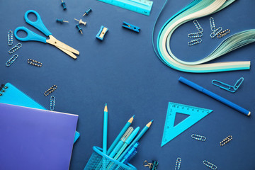 Set of school stationery on color background
