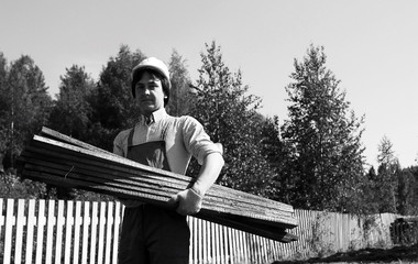 man in worker's clothes black and white