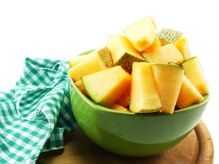 close up of cantaloupe melon slices on white background