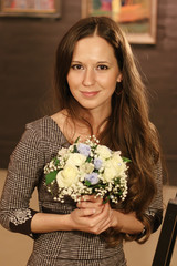 Portrait of a girl. A girl in a dress at a party