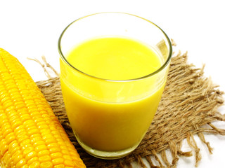fresh sweet corn juice corn milk on white background
