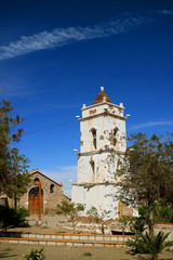 Fototapeta na wymiar Saint Lucas Church and the Bell Tower in the Town of Toconao, Located near San Pedro de Atacama, Chile